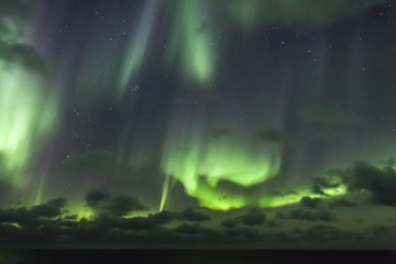 Aurora borealis (Northern Lights) over Arctic ocean