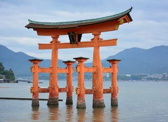 Landscape views, mountains, blue sky, fish, bridge.