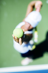 Beautiful female tennis player serving © NDABCREATIVITY