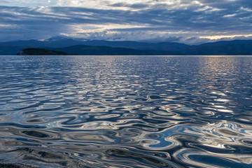 Landscape with silver water on a cloudy day