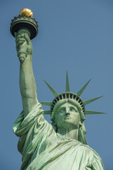 Naklejka na ściany i meble Majestic iconic lady liberty statue of liberty in New York harbor welcoming new arrivals