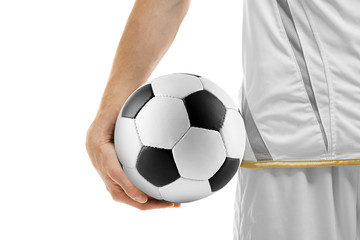 Professional football player holding ball on white background, closeup