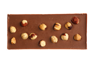 Chocolate bar with nuts on white background
