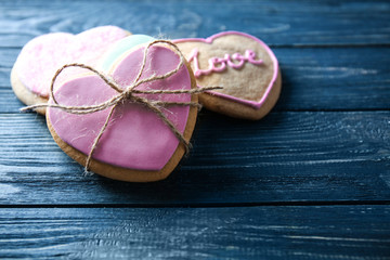 Heart shaped cookies on wooden background, closeup