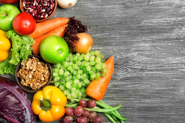 Fruits and vegetables on wooden background