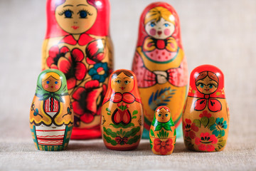 Russian dolls. Matryoshka on linen fabric for the background.