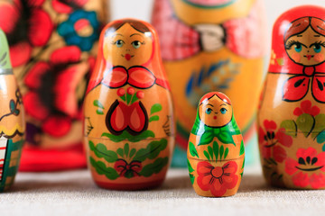 Russian dolls. Matryoshka on linen fabric for the background.