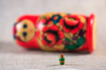 Russian dolls. Matryoshka on linen fabric for the background.
