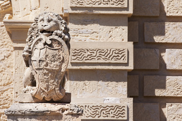 Lion statue at the entrance gate in the city of Mdina, Malta 