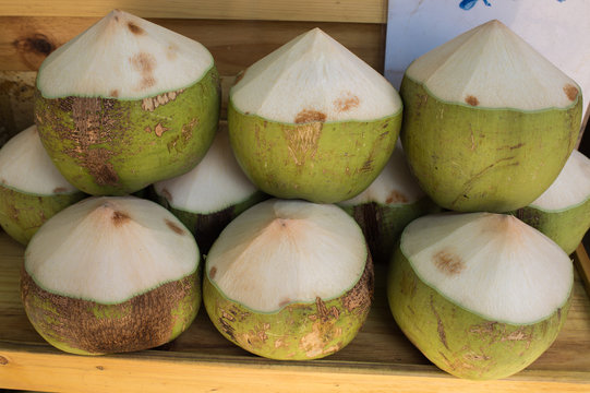 Fresh coconuts in the market, Thailand