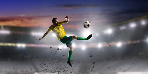 Fototapeta Soccer palyer kick ball obraz