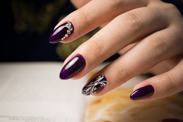 The beauty of the natural nails. Perfect clean manicure for the bright people. Nail drill machine and cuticle nipper are used simultaneously to make such a clean manicure.