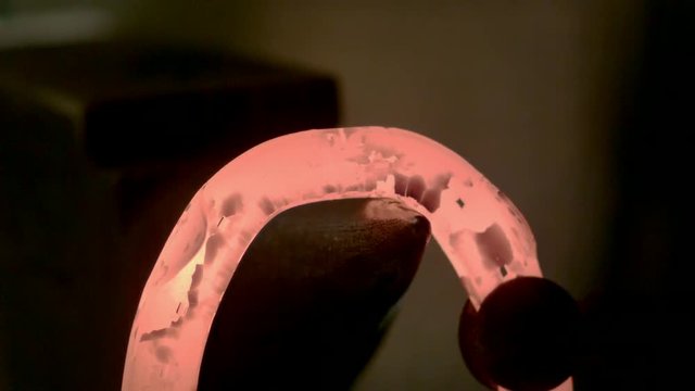 Glowing Horseshoe Hammering Slow Motion 03