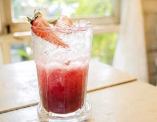 Berry soda on wooden table