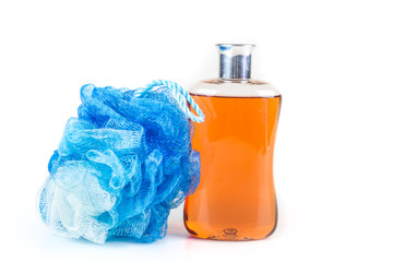 Body wash and loofah isolated on white background