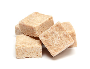Brown sugar cube isolated on white background