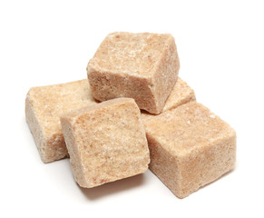 Brown sugar cube isolated on white background