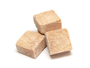 Brown sugar cube isolated on white background