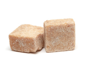 Brown sugar cube isolated on white background