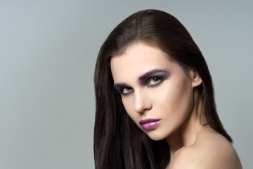 Portrait of beautiful woman model with professional makeup