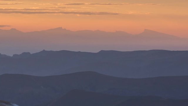 Russia, timelapse. The formation and movements of clouds up to the steep slopes of the  mountains of Central Caucasus peaks.