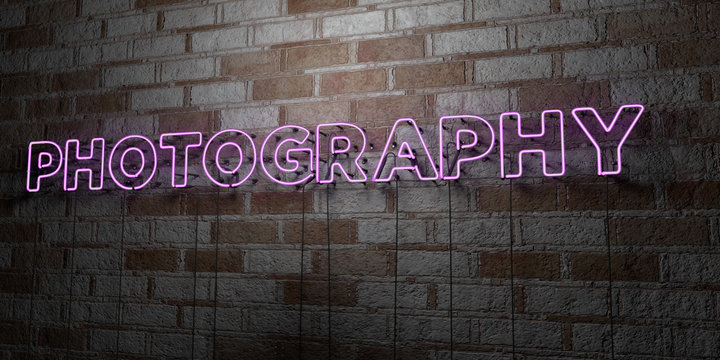 PHOTOGRAPHY - Glowing Neon Sign on stonework wall - 3D rendered royalty free stock illustration.  Can be used for online banner ads and direct mailers..