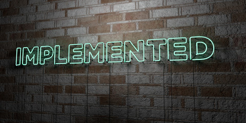 IMPLEMENTED - Glowing Neon Sign on stonework wall - 3D rendered royalty free stock illustration.  Can be used for online banner ads and direct mailers..