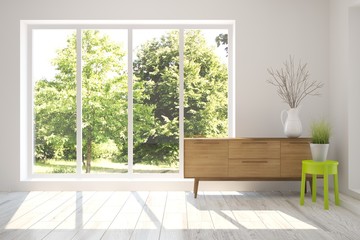 White room with shelf and green landscape in window. Scandinavian interior design