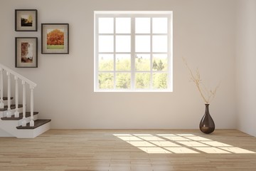 White room with stair and green landscape in window. Scandinavian interior design