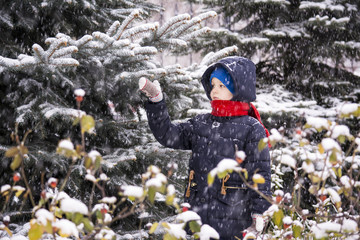 boy outdoors in the winter snow © mikitiger