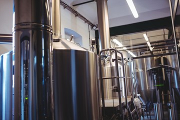 Obraz na płótnie Canvas Industrial equipment at brewery
