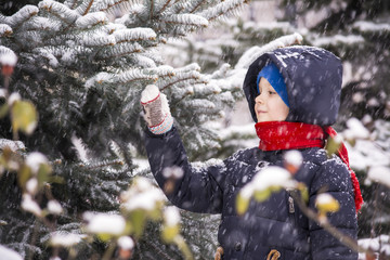boy outdoors in the winter snow © mikitiger