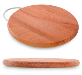 Round wooden cutting board with metal pen on a white background.