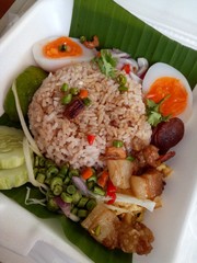 Rice mixed with vegetable and  boiled egg in form box, thai crusine food