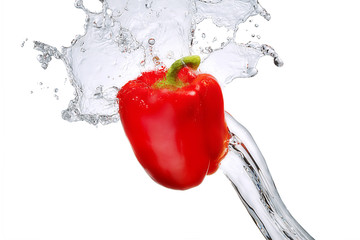 Water splash and vegetables isolated on white backgroud with clipping path. Fresh bell pepper