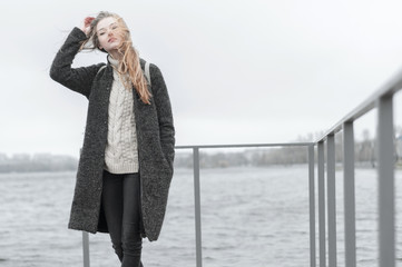 wind blowing hair young woman outside