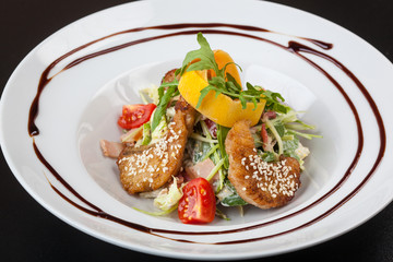 Salad with fried Pike perch