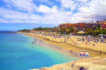 Fototapeta na wymiar Coastal view of El Duque beach in Costa Adeje,Tenerife,Canary Islands,Spain.Travel or vacation concept.