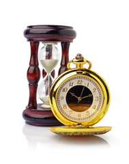 Vintage golden pocket watch and wooden hourglass