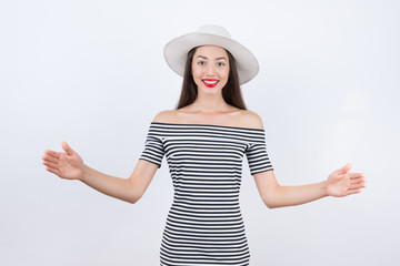 youngl smiling girl shows a sign big