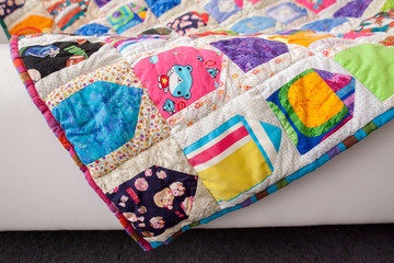 Patchwork quilt. Part of patchwork quilt as background. Handmade. Colorful blanket.