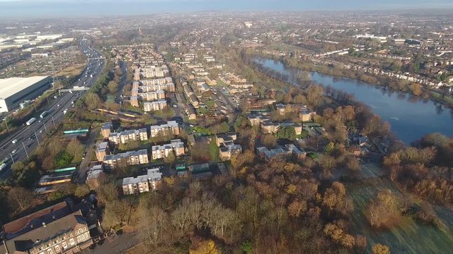 Aerial view of a housing estate and reservoir in Birmingham, UK.