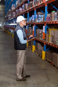 Warehouse worker checking the inventory
