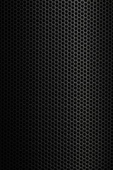 black, perforated metal texture with circle mesh