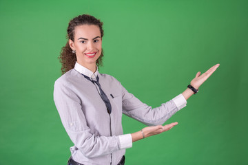 Cheerful businesswoman indicating something
