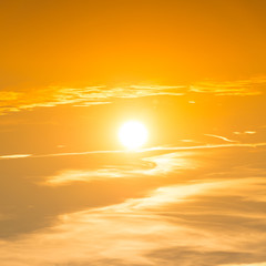 Sunset in the sky with orange clouds
