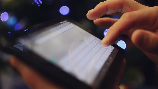Man hand using tablet on christmas 