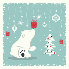 The cover design. Depicts a seated little polar bear. A garland of snow balls, christmas toys, gift box, snowflakes and christmas tree  on blue background.