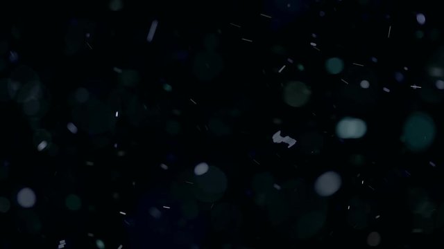 Background of natural floating dust particles backlit with lens flare.
