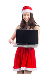 Asian Christmas girl with Santa Claus clothes holding laptop iso